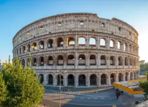 European History Photo of The Colosseum in Rome, Italy, bathed in the warm light of the setting sun.