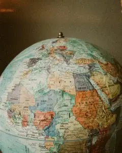 History photo of a globe showing the details of different continents.