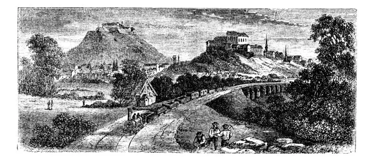 Vintage black and white illustration showcasing the early stages of the Industrial Revolution in the United States with a train passing by a small station, townspeople, and industrial buildings in the background.